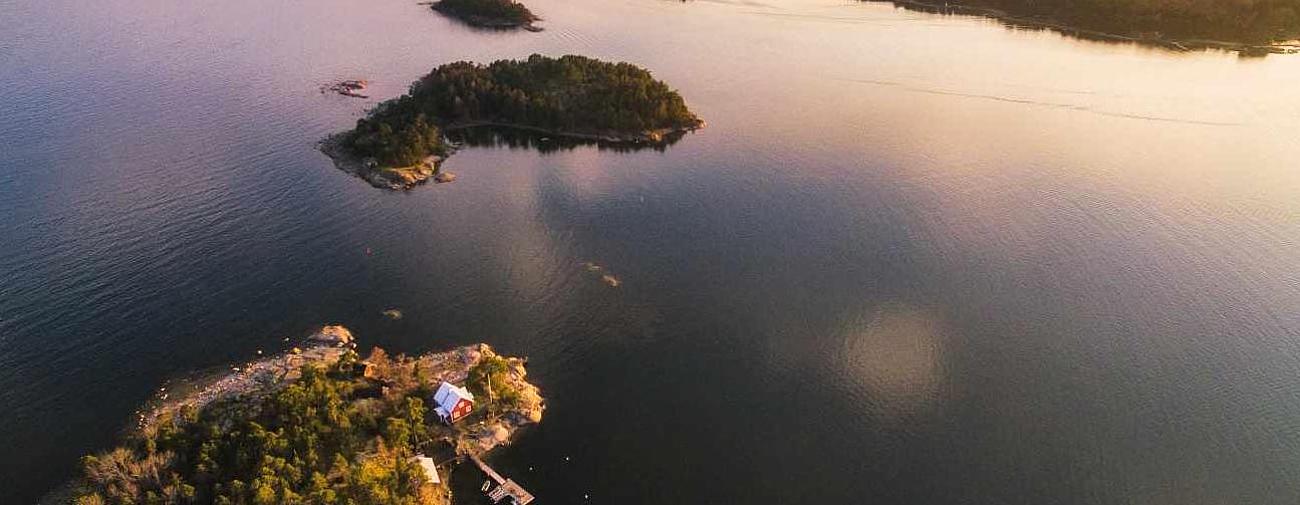 Archipelagoes from above in a beautiful sunset lightning.